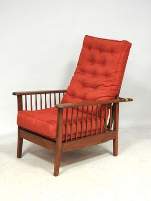 an image of a chair with a red cushion and a wooden frame