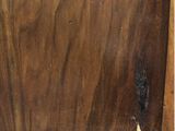 a close up of a piece of wood with a hole in it