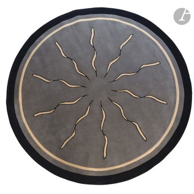 an image of a round rug with a design on it