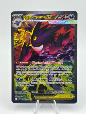 a close up of a pokemon card on a white surface