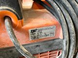 a close up of a machine that has a hose attached to it