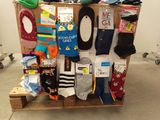 many pairs of socks that are on a pallet