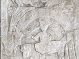 une image représentant un relief en pierre représentant un homme et un cheval
