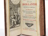 an open book with a picture of a man and a woman in a kitchen