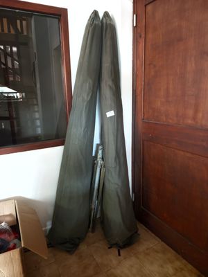 two surfboards and a box in a room