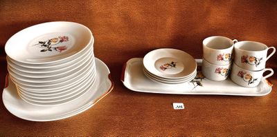 a lot of plates and cups on the table