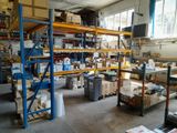 a large room with a lot of boxes and boxes on the shelves