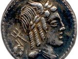 une pièce d'argent représentant la tête d'un homme coiffé d'une coiffe