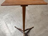 an image of a small table with a wooden top