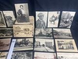 several old black and white photographs of people and buildings
