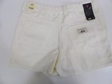 the shorts are white and have a black tag on it
