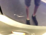 a reflection of a person in a mirror on a plane