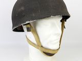 an old helmet on a mannequin head on a white background