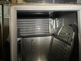 an image of a stainless steel refrigerator in a kitchen