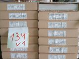 a stack of boxes with a price tag on them