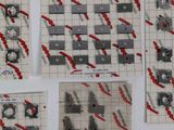 several pieces of paper with red and black designs on them