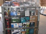 a metal cart with many items in it in a warehouse