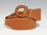 brown leather belt with white stitching and a gold buckle