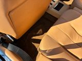 a car with a tan leather interior and tan leather seats