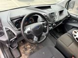 a dashboard of a car with a steering wheel and a steering wheel