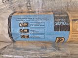 a roll of plastic wrapped in plastic wrap on a table