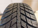a close up of a tire on a white surface