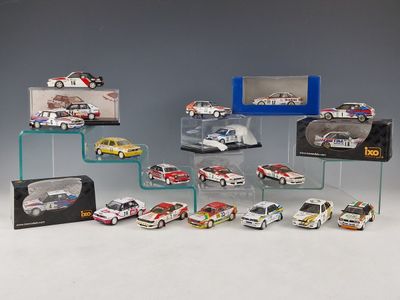 a lot of cars that are on display in a display case