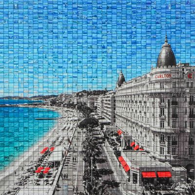 a picture of a picture of a city by the water
