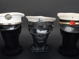 three hats that are sitting on top of each other
