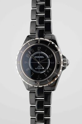 an image of a close up of a wrist watch on a white background