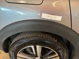 a close up of a car with a sticker on the side of it
