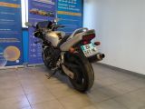 a motorcycle that is parked in a showroom