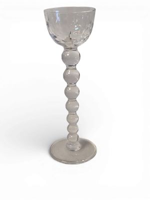 a glass that is sitting on top of a table