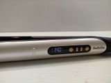 a black and white electronic device sitting on a table