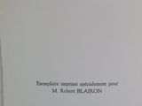 an open book with a black and white image on it