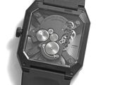 a black watch with a silver face on a white surface
