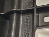 a close up of a tray of food with utensils in it