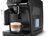 a black coffee machine with a cup of coffee in front of it