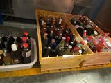 many bottles of wine in a wooden crate
