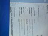a picture of a computer screen with a ticket on it