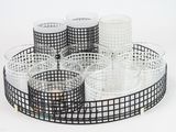 a tray with glasses and cups on it on a white surface