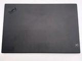 an image of a black mouse pad on a white surface