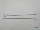 a pair of stainless steel hooks on a white surface