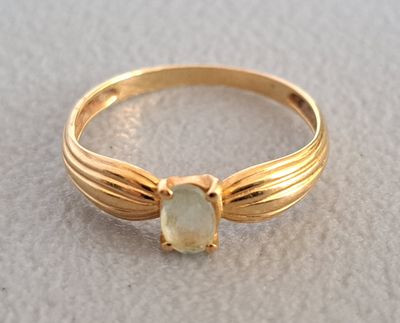 Bague à monture en or 18K 750 millièmes, à motifs rubanée, c… - Photo 1