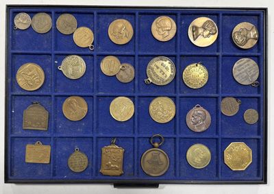 a display case with a lot of coins in it
