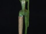 an image of a statue of a woman holding a bowl on her head