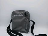 une image représentant un petit sac muni d'une lanière
