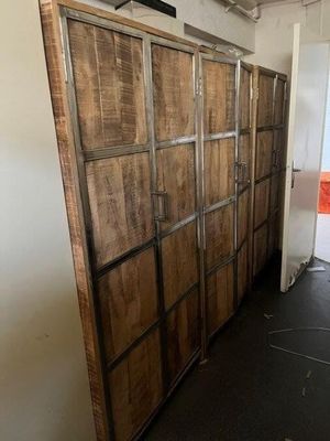 an image of a room with a bunch of wooden cabinets