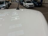many cars parked in a parking lot in a parking lot