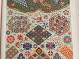 a close up of a book with a pattern on it